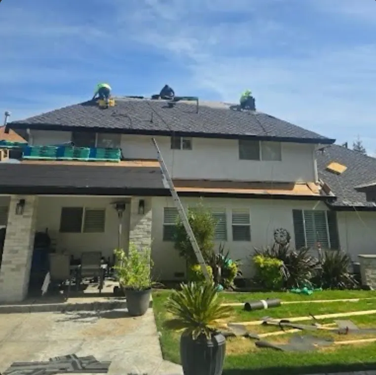 PRC 13 Roofing crew installing shingles