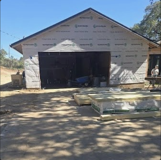 Garage elevation during James Hardie siding installation in Sacramento, CA