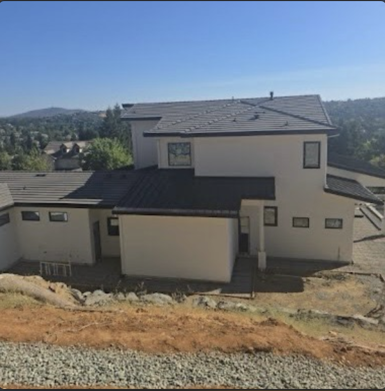 Completed residential roof on a hillside Sacramento area home