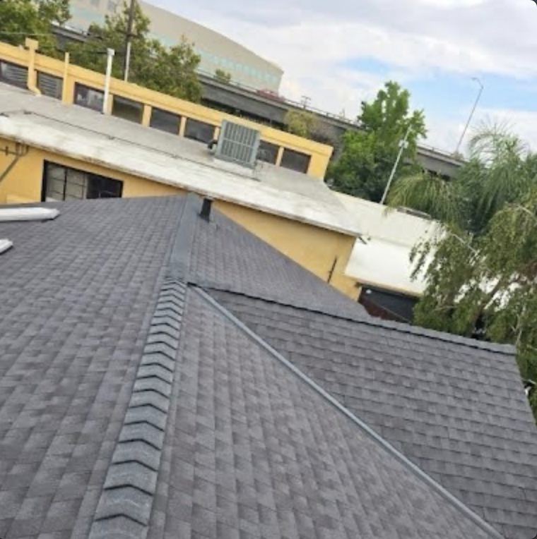 Completed shingle roof with clean valley detail